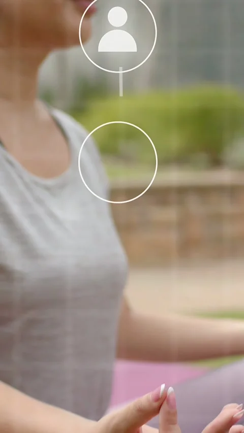 Vertical video: Circle appearing over chest, woman holding mudra on mat, icons Stock Footage 334378011