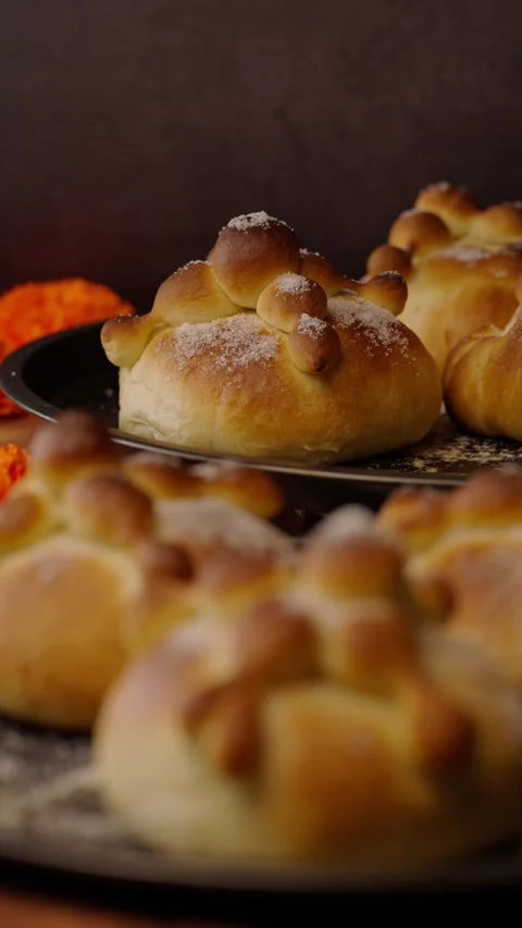 Vertical video, circular tray with homemade bread of the dead, hojaldras Stock Footage 282499721