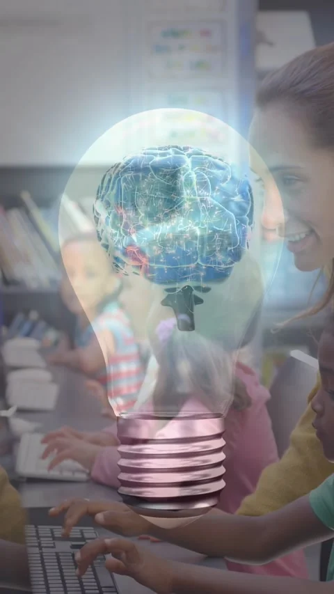 Vertical video: Class typing keyboards sparking lightbulb brain rotating to Stock Footage 328332015