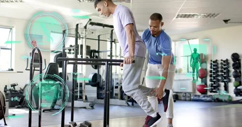 Vertical video: Client leaning on dip bars, purple tee doing dips at gym, Stock Footage 330459527
