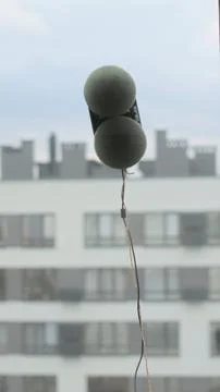 Vertical video Close up automatic window cleaning robot operating on residential Stock Photos