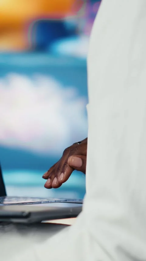 Vertical video Close up of biomedical engineer studying pathogens using laptop Stock Footage 318684643
