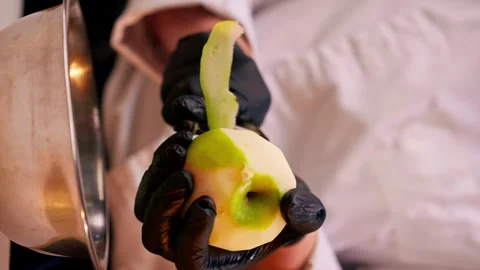 Vertical video close-up of a chef's hands in the kitchen in a white jacket Stock Footage 273558223
