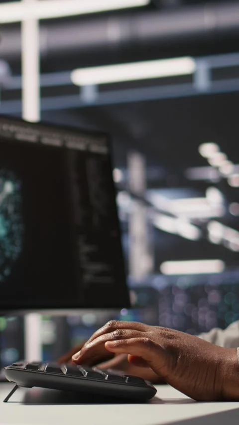 Vertical video Close up of data center admin coding, writing script on PC Stock Footage 309254494