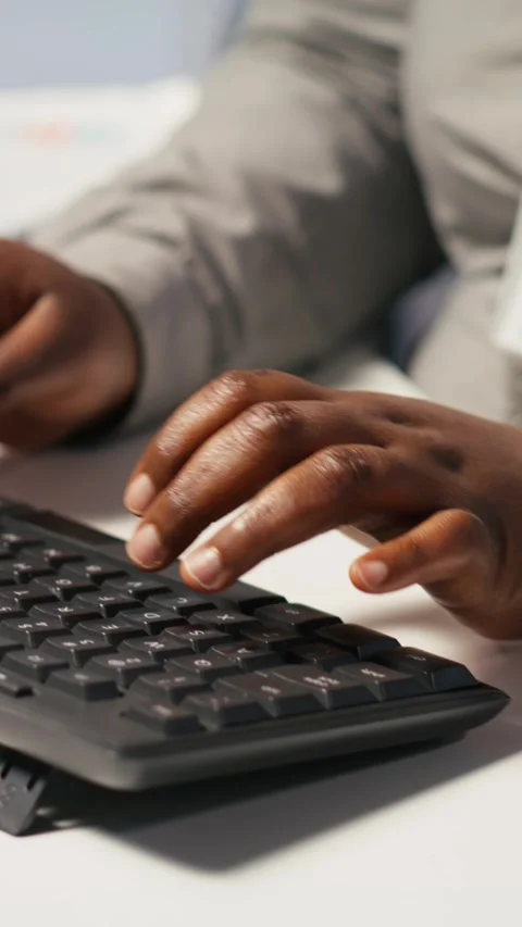 Vertical video Close up of data center admin coding on PC, typing on computer Stock Footage 309486798