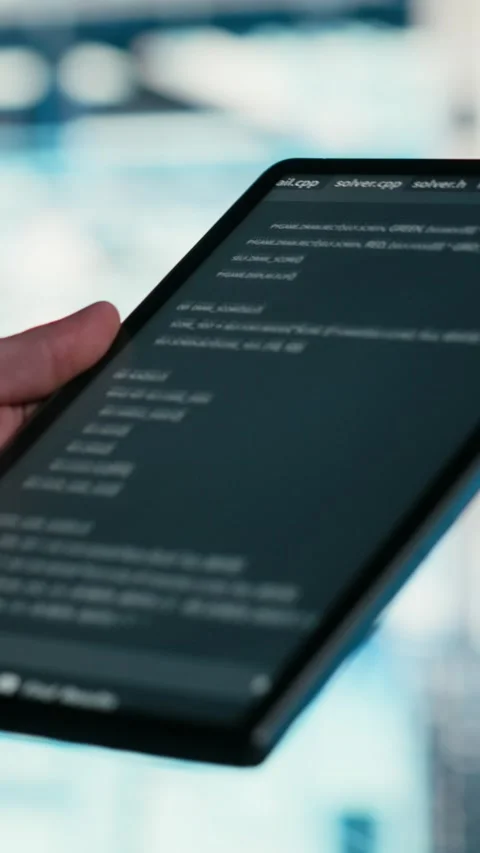 Vertical video Close up of data center engineer using tablet to write code Stock Footage 329591005