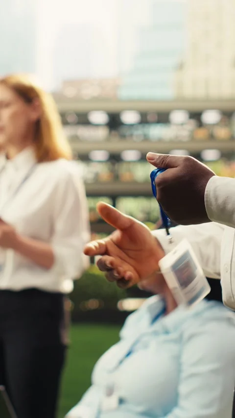 Vertical Video Close up handshake between professionals during outdoor Stock Footage 339069875
