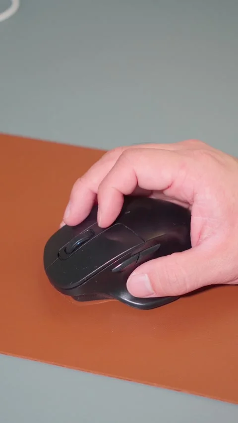 Vertical Video Close Up Man Hand Using Computer Mouse at Office Desk Stock Footage 341919846
