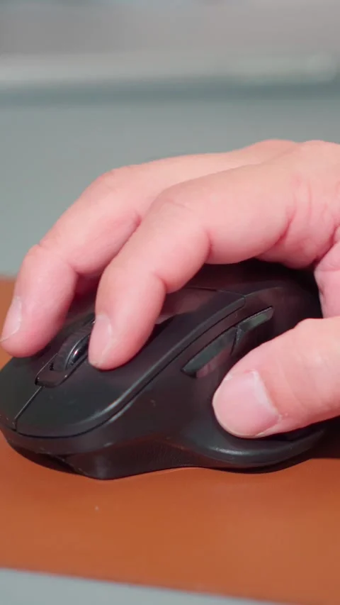 Vertical Video Close Up Man Hand Using Computer Mouse at Office Desk Stock Footage 341919893