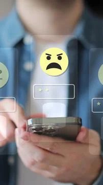 Vertical video Close-up of man hands using smartphone, rating of the qualit.. Stock Photos