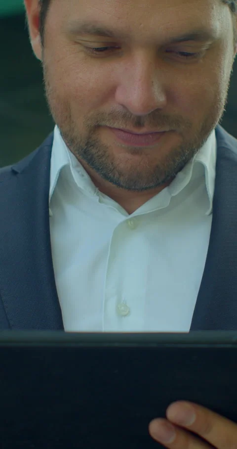 Vertical video. Close up of Man Holding Modern digital tablet. Stock Footage 345586280