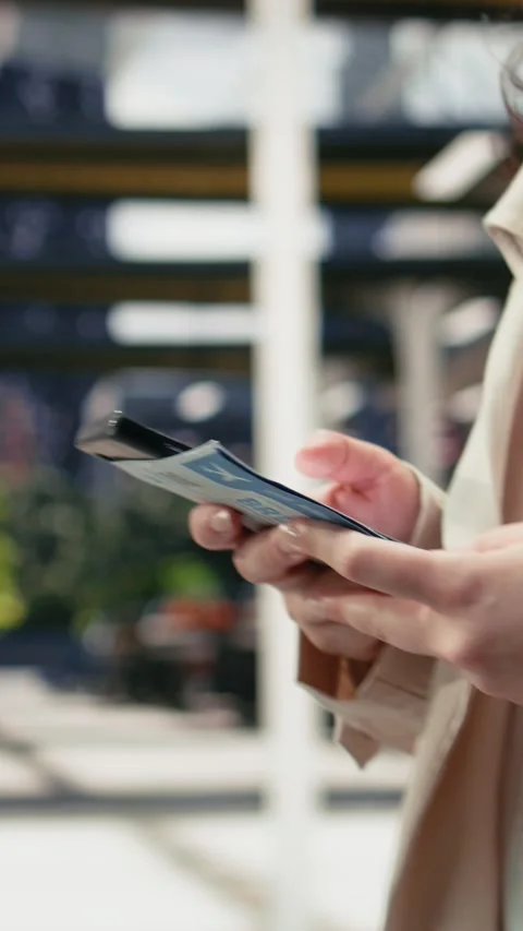 Vertical video Close up of passenger typing text messages on mobile device Stock Footage 340204040