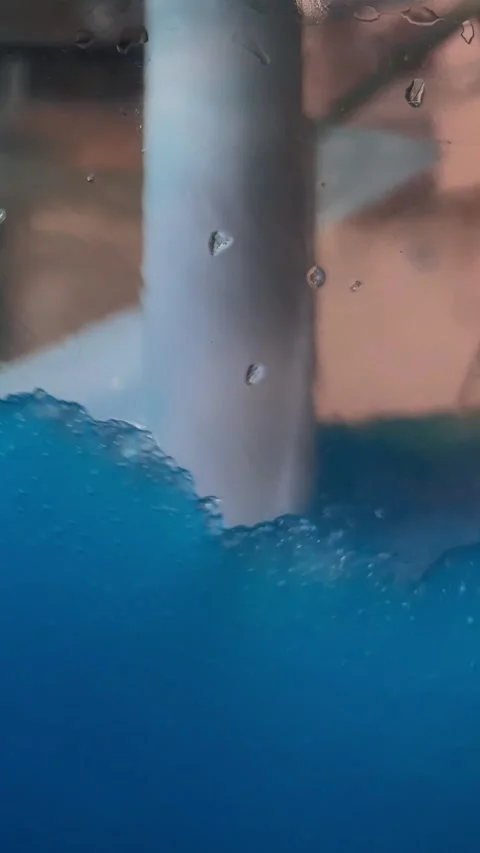 Vertical video close up. Protein shake, cold drink preparation process Stock Footage 308344808
