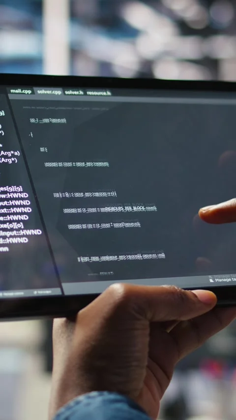Vertical video Close up of server room programmer checking coding on tablet Stock Footage 308757415