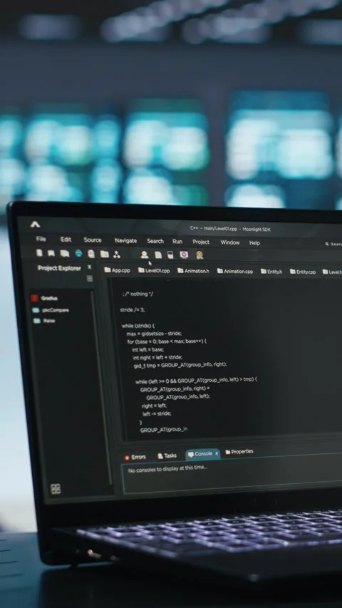 Vertical video Close up shot of laptop used by worker monitoring servers energy Stock Footage 274680105