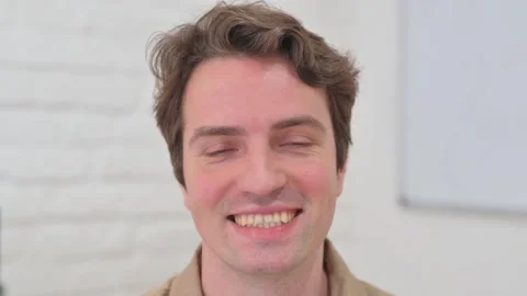 Vertical Video, Close up, Smiling Young Man Face Video stock 312914647