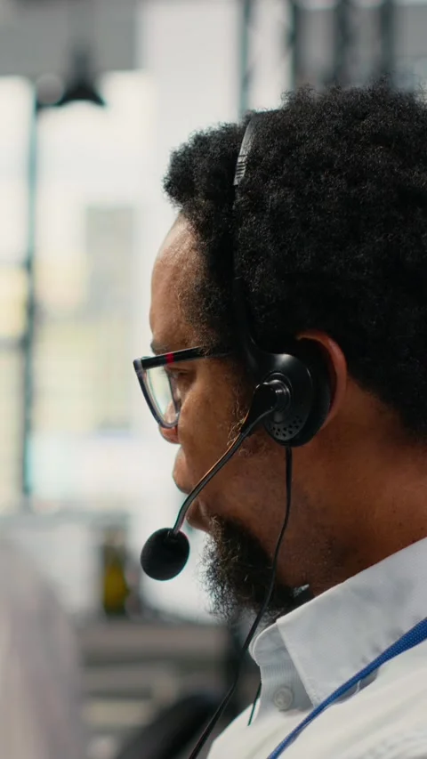 Vertical video Close up of startup software developer doing tech support Stock Footage 323143051