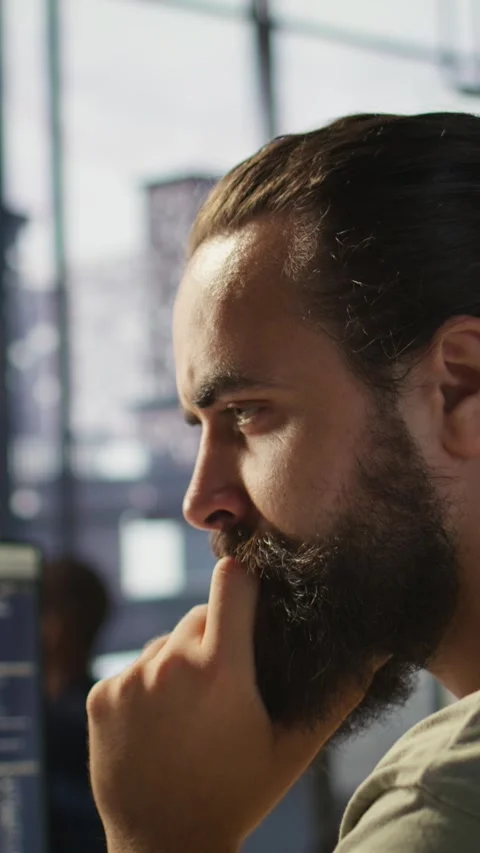 Vertical video Close up of system administrator transforming data into Stock Footage 319490873