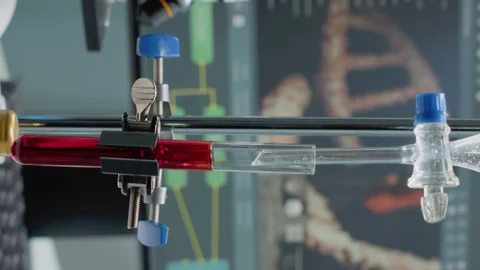 Vertical video: Close up of test tube and pipe for mixing solutions in 動画素材 163216624