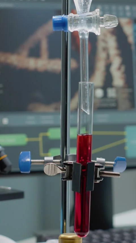 Vertical video: Close up of test tube and pipe for mixing solutions in 動画素材 219464931