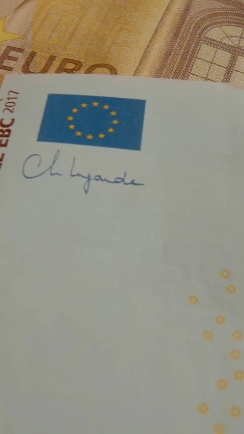 Vertical video Close up view of a 50 euro banknote showcasing intricate designs Stock Footage 327596499