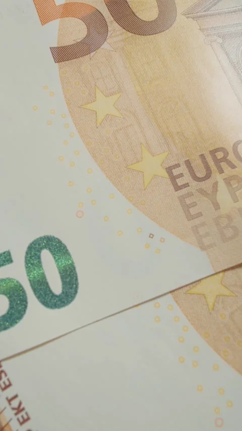 Vertical video Close up view of 50 euro banknote showing intricate details and Stock Footage 327596666
