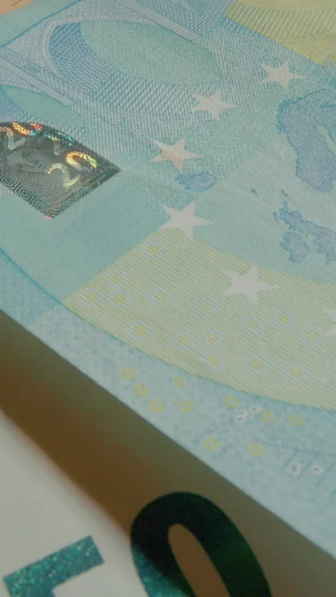 Vertical video Close up view of euro banknotes highlighting intricate details Stock Footage 327596665