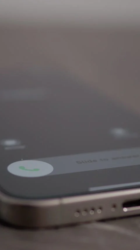 Vertical video Close up view of incoming call on smartphone with options to Stock Footage 346716384