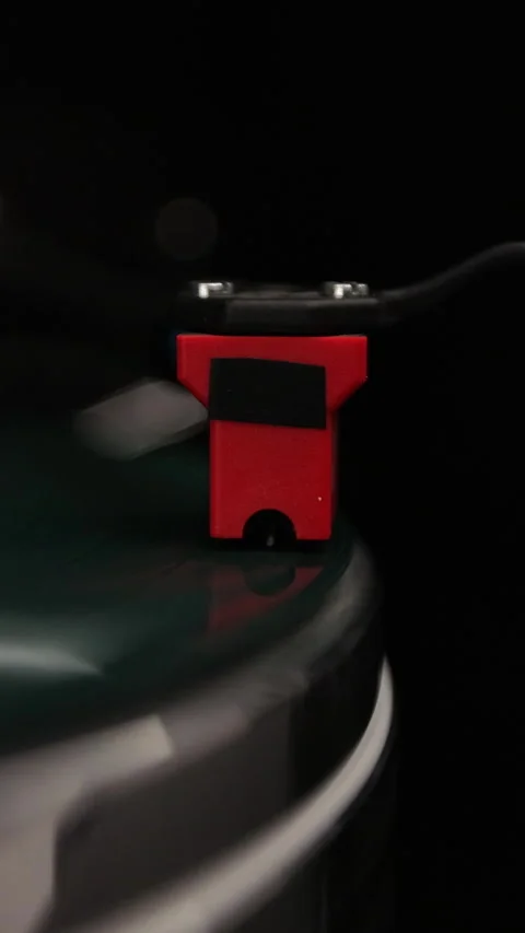 Vertical video Close-up of a vinyl record and a turntable needle. Stock Footage 338083553
