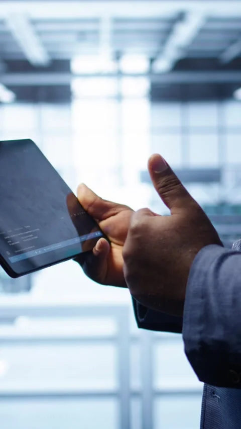 Vertical video Close up of worker fixing errors affecting servers performance Stock Footage 277859298