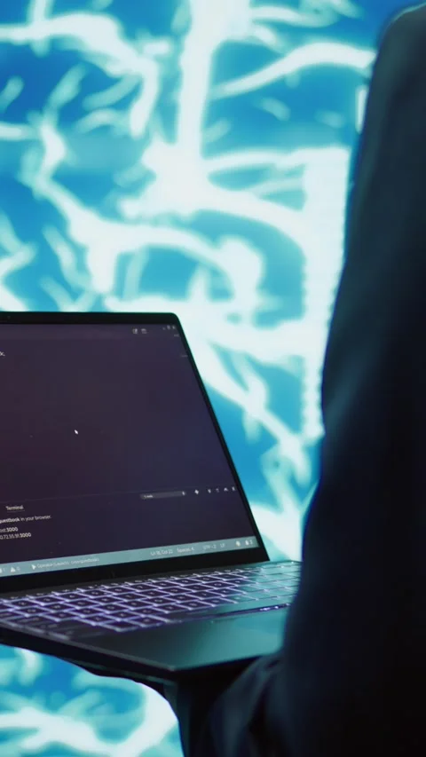 Vertical video Close up of worker using AI deep learning and laptop to look at Stock Footage 278375020