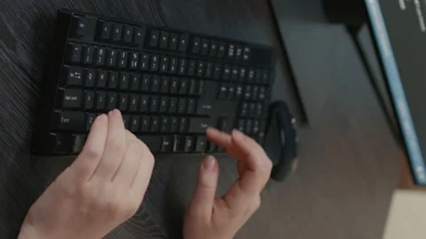 Vertical video Closeup of caucasian programer hands typing code on keyboard in Stock Footage 194146147