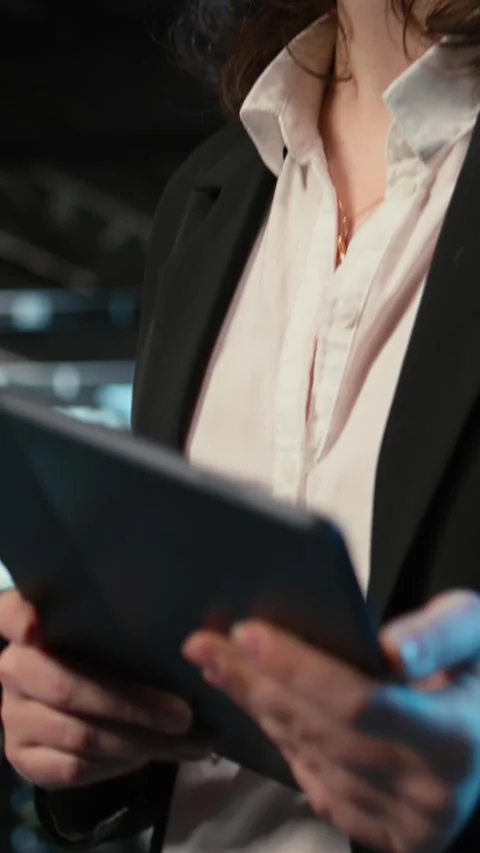 Vertical video Closeup of programmer walking in data center, optimizing server Stock-Footage 329320340