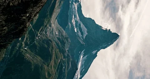 Vertical video - Clouds in the background of  Matterhorn and Zermatt Valley Stockbeeldmateriaal 158574967