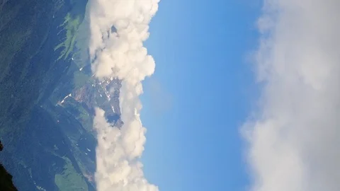 Vertical video. Clouds over the mountain ridge. Time Lapse. Krasnaya Polyana, Stockbeeldmateriaal 85362080