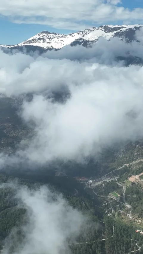 Vertical Video Cloudy landscape in the mountains aerial view Stock Footage 222484465