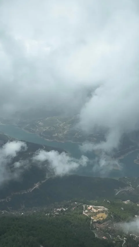 Vertical Video Cloudy landscape in the mountains aerial view Stock Footage 222495697