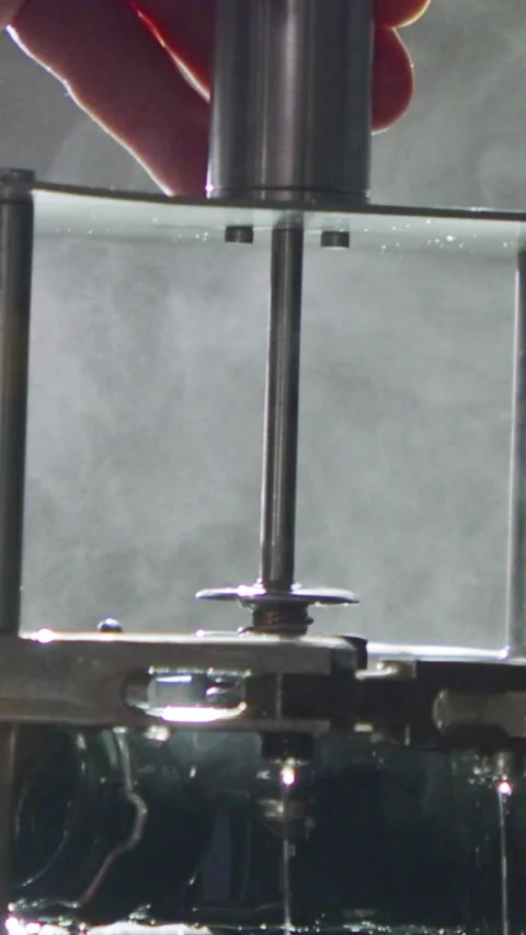 Vertical video of CMM measuring machine probing a high precision metal part Stock Footage 206328242