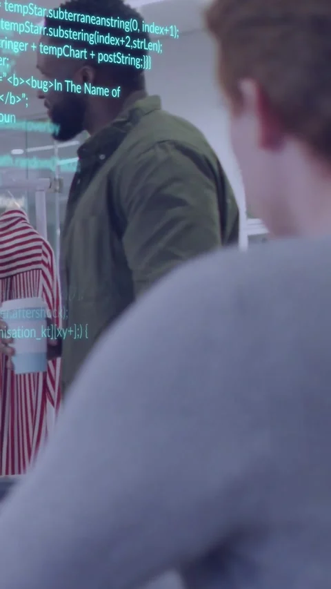 Vertical video: Code overlay appearing, man in olive coat shifting toward peer Stock Footage 331050417
