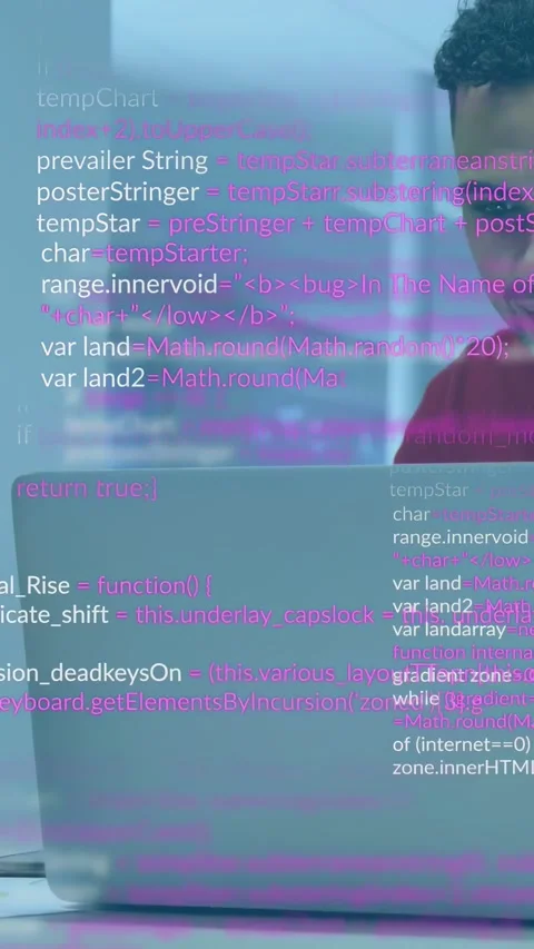 Vertical video: Code overlay appearing, developer leaning forward, typing on 動画素材 333496464
