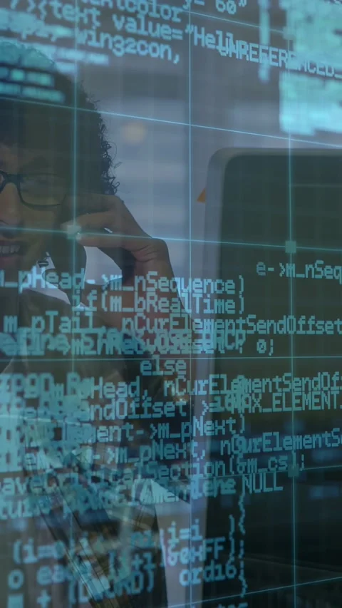 Vertical video: Coder receiving call, holding phone to ear as code and grid Stock Footage 333236566