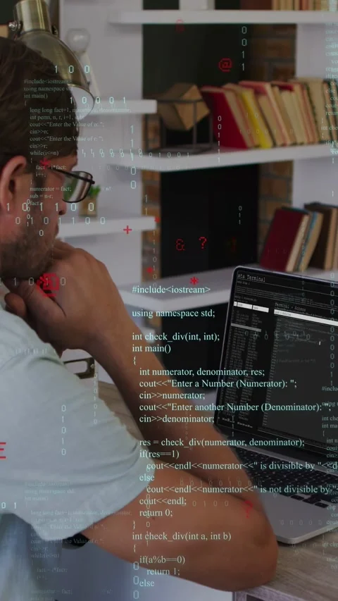 Vertical video: Coder sitting in study fixing gaze on laptop reading code with Stock Footage 335355229