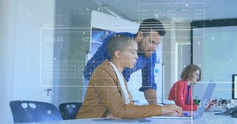 Vertical video: Collaborating team in brown blazer, blue shirt typing on laptop Stock Photos