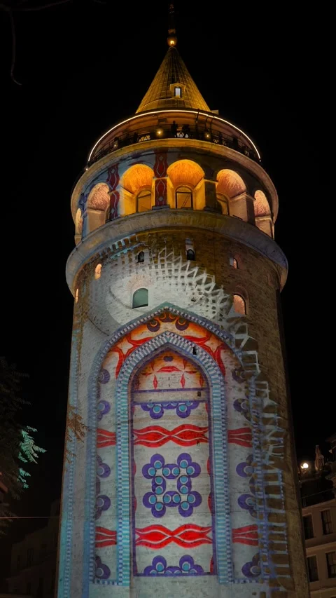 Vertical video: colorful video mapping projection on Galata Tower, Istanbul Video stock 339028292