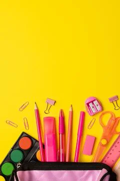 Vertical video of composition with pink school items and case on yellow surface Stock Photos