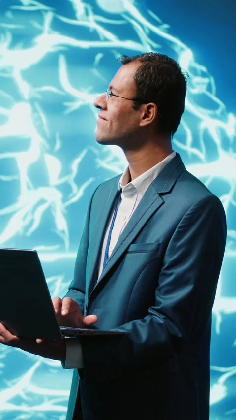 Vertical video Computer scientist using laptop to implement artificial Stock Footage 278375250