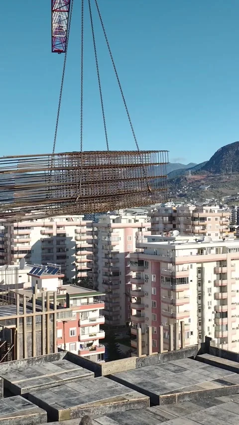 Vertical Video Concrete Building Skeleton with Multiple Floors and Visible Stock Footage 342449693