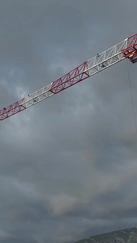 Vertical Video: Concrete pouring in progress on a busy residential construction Stock Footage 297654828