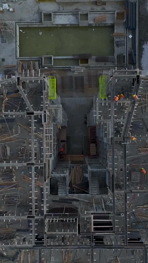 Vertical Video: Construction Site Activities With Workers Preparing Structures Video stock 342573995