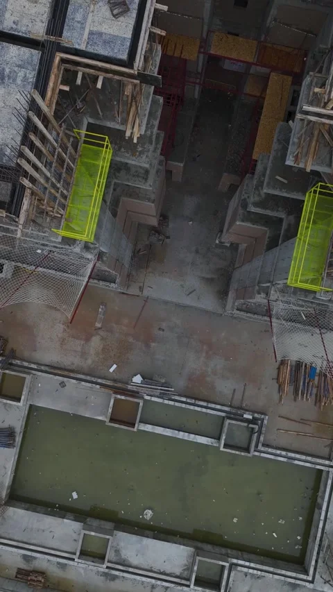 Vertical Video: Construction Site Activities With Workers Using Tools and Stock Footage 342574687